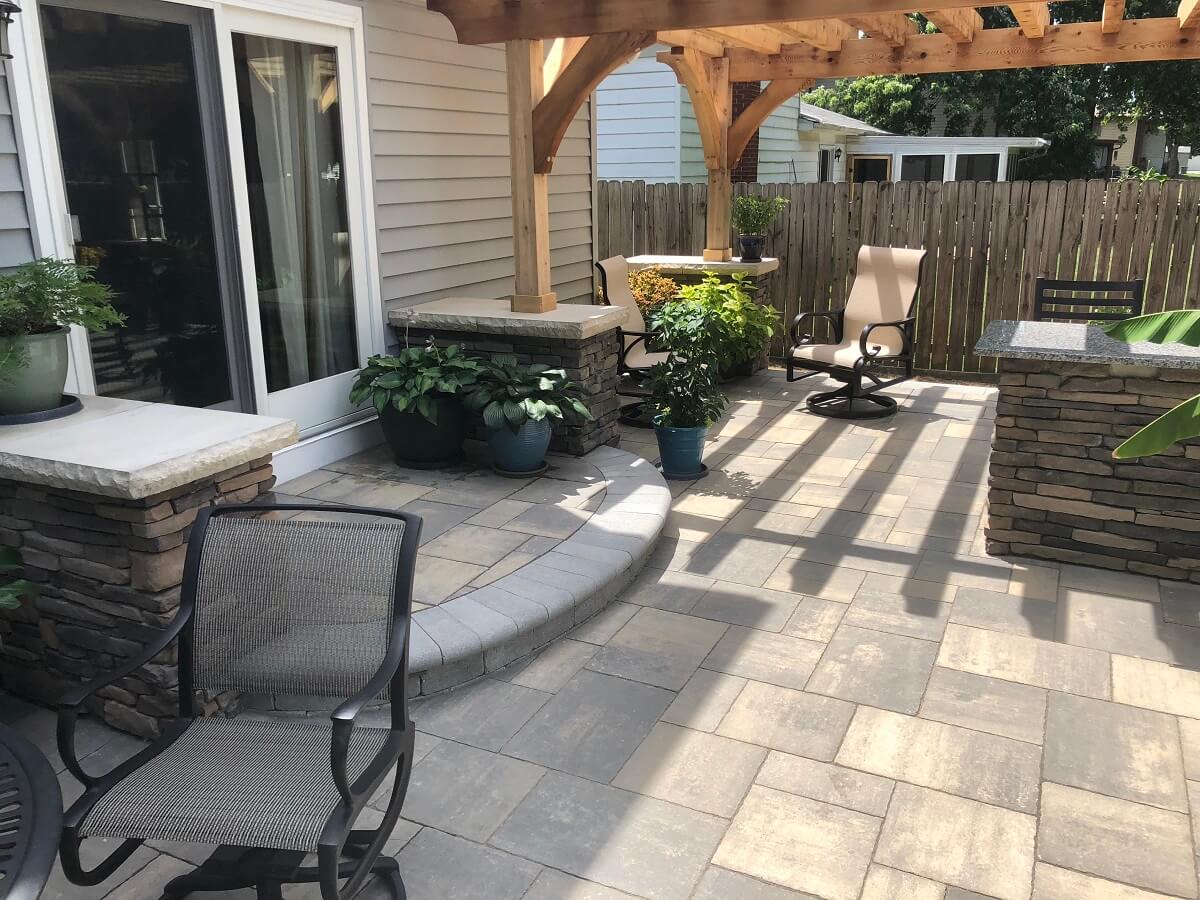 outdoor kitchen and pergola with plants in Pickerington, OH